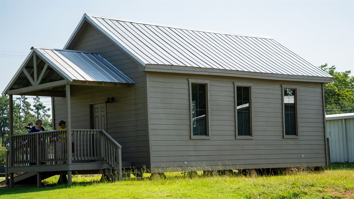 The Cooper Hill School House and open lawn at Falkner Heritage Park, where Founders Day is held.